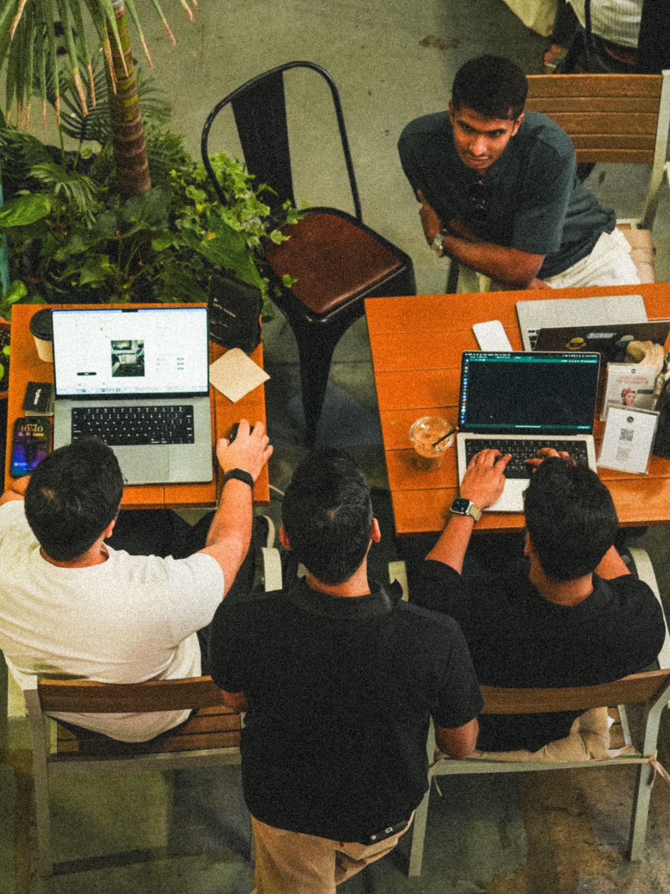 Cafe Cursor Dubai builders watching a Cursor walkthrough