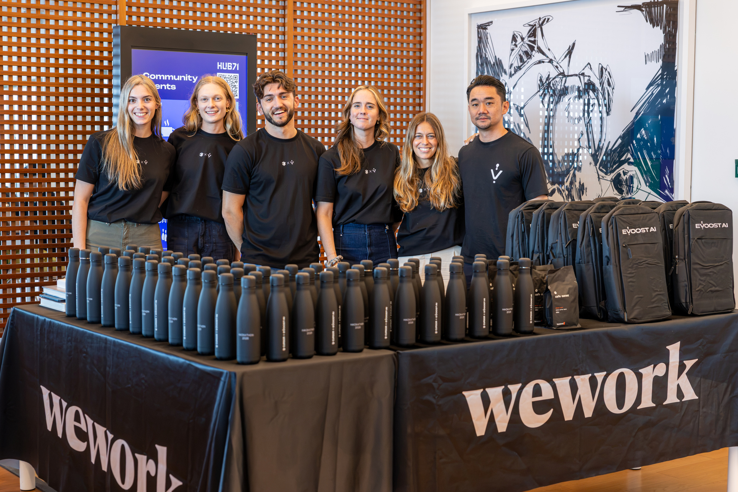 Cursor x eVoost AI Hackathon welcome table